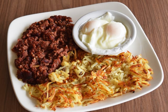 Homemade Corned Beef Hash and Poached Eggs.